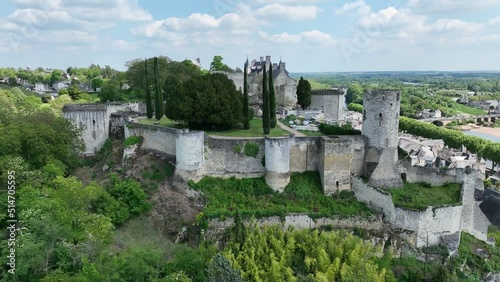 Aerial view of the royal lodgings in the middle castle of Chinon with adjoining curtain walls restored recently with blue cloudy summer sky