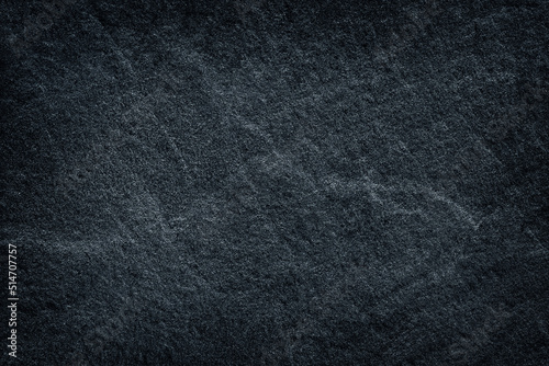 Dark grey black slate stone texture or black sand stone background