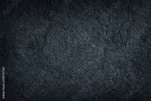 Dark grey black slate stone texture or black sand stone background