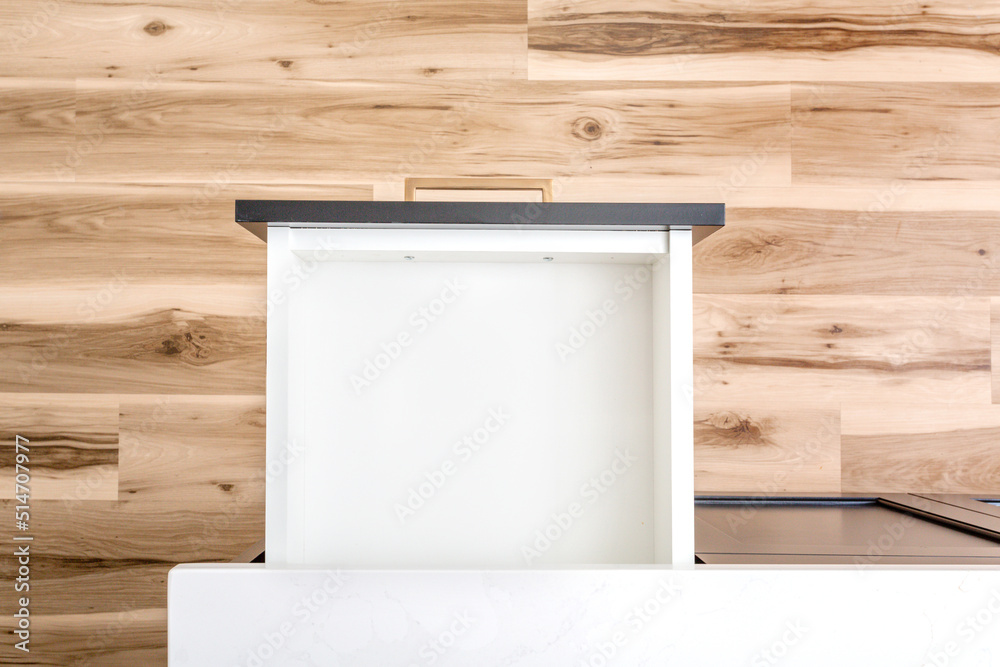 A top view of an open empty kitchen or bathroom drawer. - obrazy, fototapety, plakaty 