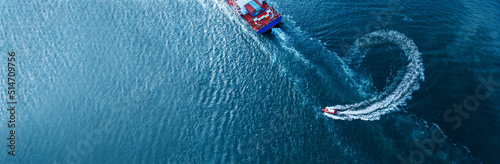 Photography Pilot boat turn behind stern of Vessel Cargo container Ship in the ocean sea con