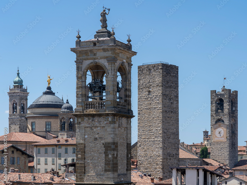Fototapeta premium Bergamo, Italy. The old town. Landscape at the city center, the old towers and the clock towers from the ancient fortress called La rocca. Bergamo best of Italy and touristic destination