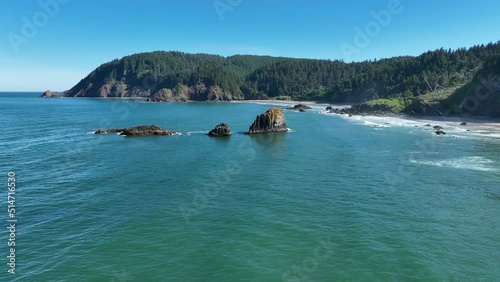 Surrounded by ocean, rugged sea stacks lie just off the Northern Oregon shoreline, not far west of Portland. This part of the Pacific Northwest is full of scenic forests and impressive coastlines. photo