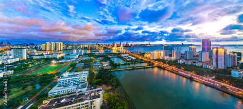 Aerial Scenic View of Haikou City, with Century Bridge and Hainan University Campus in the View, Hainan Province, China, Asia. photo