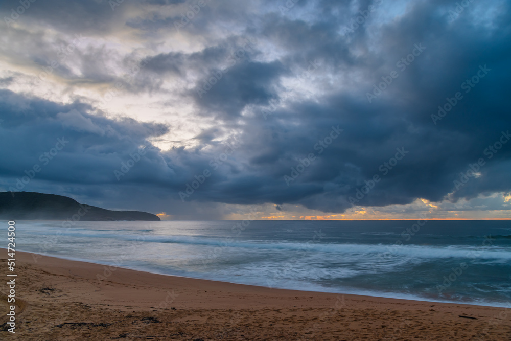 Overcast sunrise seascape with rain clouds Overcast sunrise seascape with rain clouds