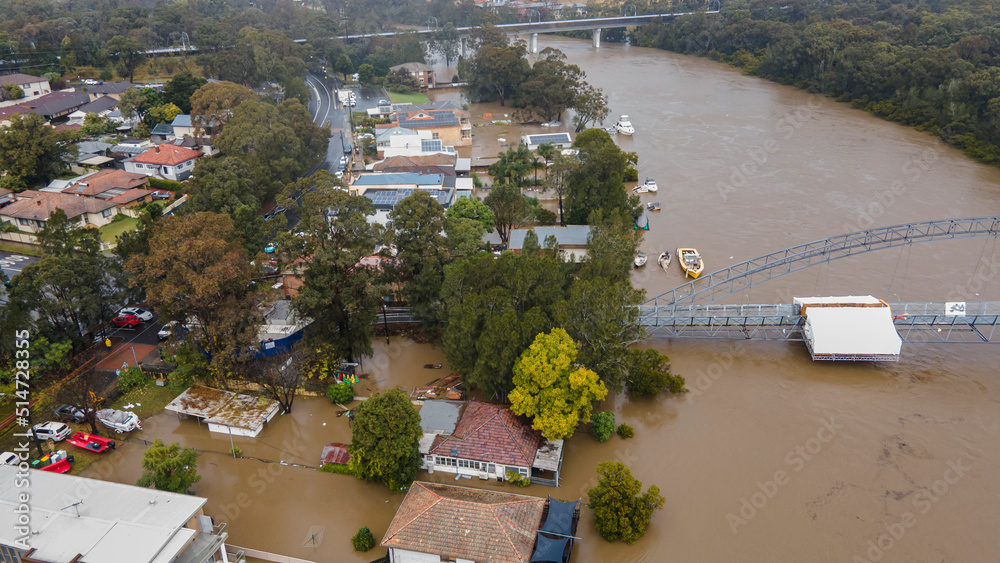 Aerial drone view of major flooding along Georges River at East Hills in South West Sydney, NSW, Australia during severe weather in July 2022 - obrazy, fototapety, plakaty 