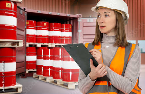 Warehouse worker woman. War...