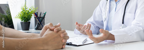 Specialist doctors advise and examine the history of patients in a direct health room at a modern hospital, Annual Health Check and Health Care Report concept.