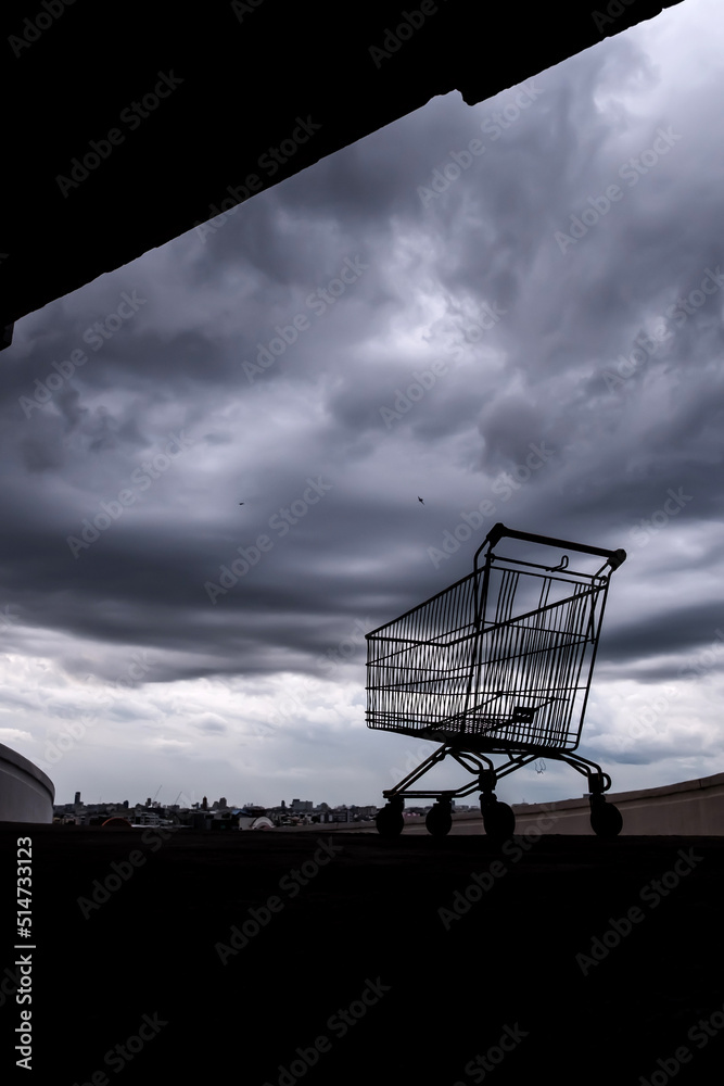 A shopping cart on a rooftop car park. A shopping cart on a rooftop car park.