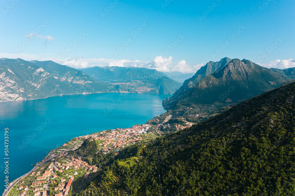 Beautiful aerial view of Torbole, Lake Garda (Lago di Garda) and the mountains, Italy. Scenic aerial view of Riva del Garda town, located on a shore of Garda lake. 