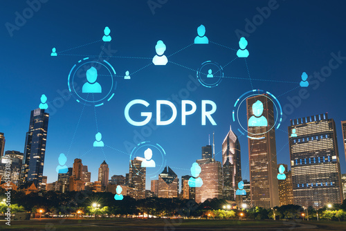 Chicago skyline from Butler Field to financial district skyscrapers, night time, Illinois, USA. Parks and gardens. GDPR hologram, concept of data protection regulation and privacy for individuals