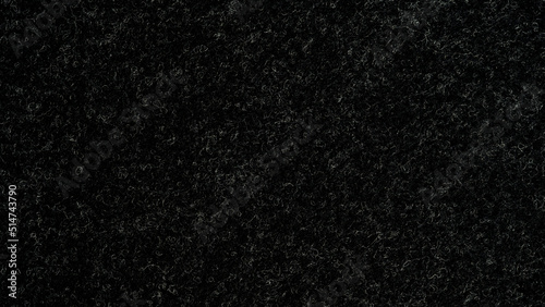 Closeup of seamlessly black and grey carpeting for background and design.