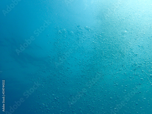 Soft focus on the air bubble in the blue ocean