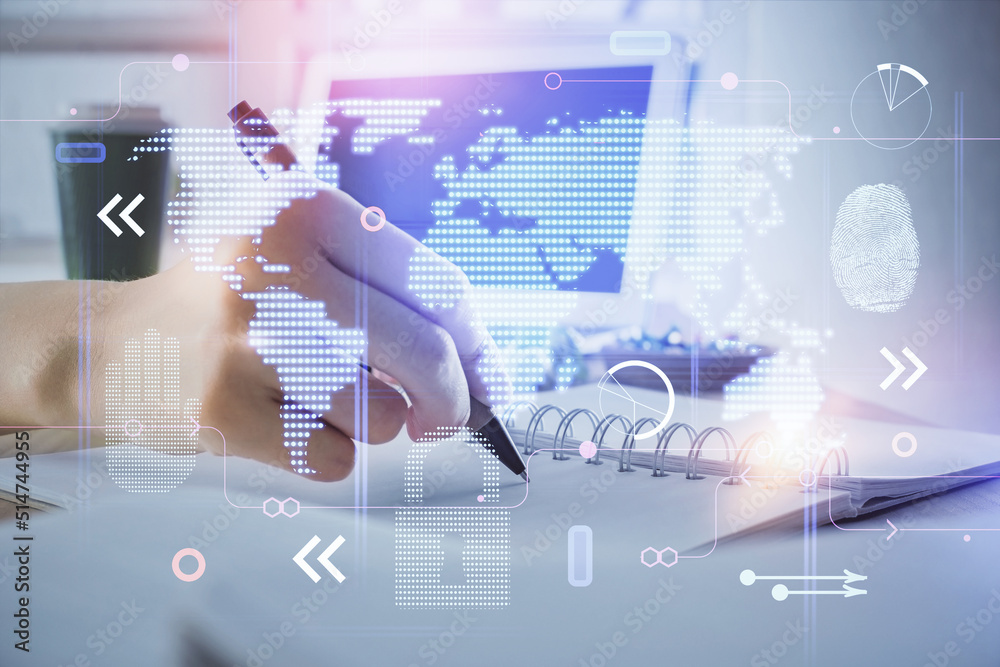 Obraz premium Double exposure of hands making notes with world map hologram and data theme icons. Concept of international network data.