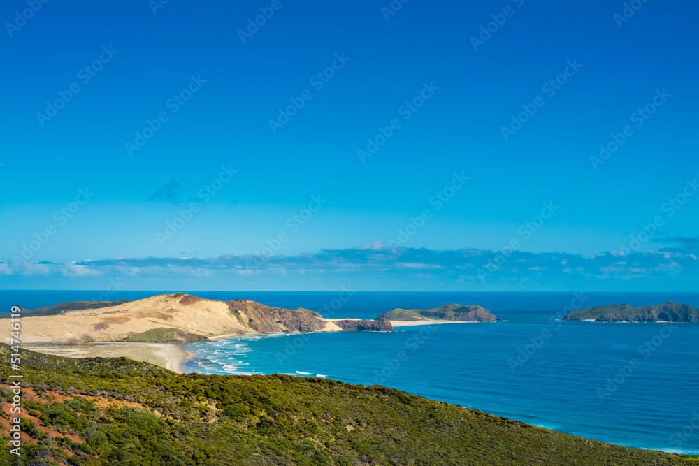 Stunning view over Te Werahi Beach and Cape Maria Van Diemen from a high vantage point in Cape Reinga. North Island, New Zealand