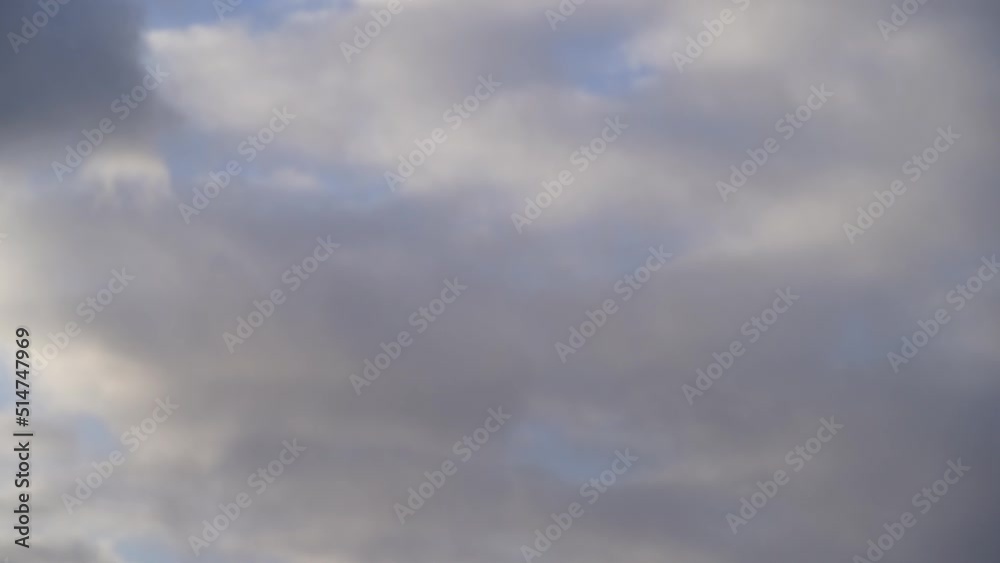 Beautiful sky with clouds background, puffy fluffy beautiful pink clouds on turquise sky time lapse. Sun ray at sunshine day before sunset in the evening Beautiful sky with clouds background, puffy fluffy beautiful pink clouds on turquise sky time lapse. Sun ray at sunshine day before sunset in the evening