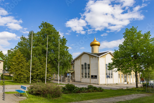 Iisalmi, Finland - June 7, 2022: Hotel Golden dome in old orthodox church in Iisalmi in Iisalmi in Savonia in Finland photo