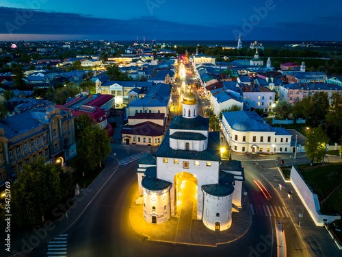 Night panoramic cityscape of Vladimir city. City streets in the evening illumination. View of the city center and the Golden Gate