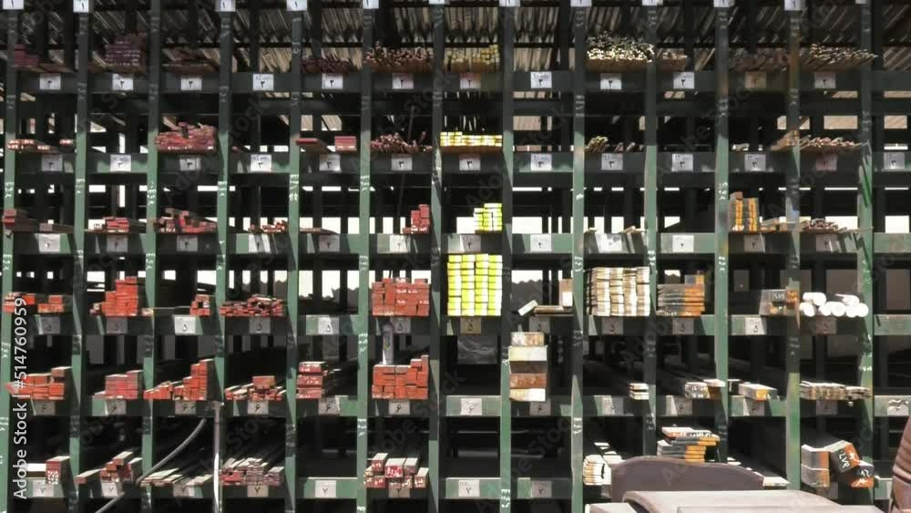 Industrial Steel Pieces On Large Warehouse Shelves Industrial Steel Pieces On Large Warehouse Shelves