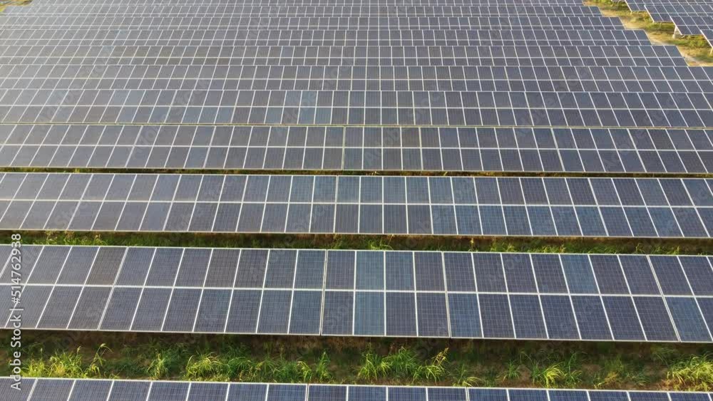 Sustainable Dreams: Sunset Over Aerial Solar Panels Sustainable Dreams: Sunset Over Aerial Solar Panels