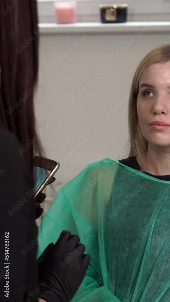 lip augmentation procedure. close-up, female face. The surgeon, in medical gloves, pierces the womens lip with a syringe and slowly injects hyaluronic acid. beauty injections. Plastic surgery. lip augmentation procedure. close-up, female face. The surgeon, in medical gloves, pierces the womens lip with a syringe and slowly injects hyaluronic acid. beauty injections. Plastic surgery.