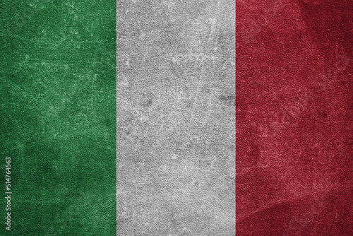 Old leather shabby background in colors of national flag. Italy