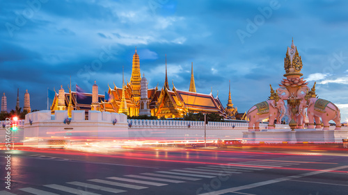 Grand palace with traffic light at dusk (Bangkok, Thailand)
