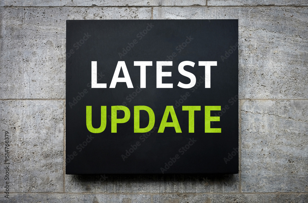 Obraz premium Latest Update - words on wall board