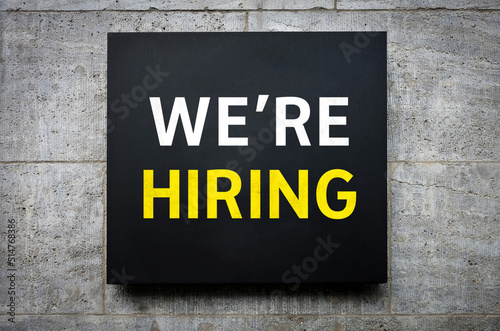 We are hiring - words on wall board