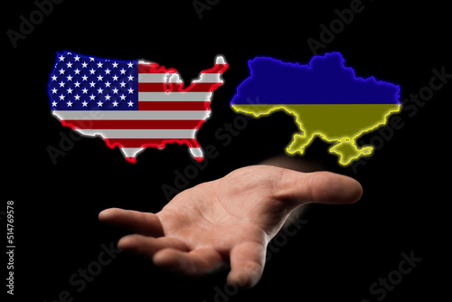 relations between the countries of Ukraine and America, USA, assistance to Ukraine in the war, maps of countries in hand on a dark background