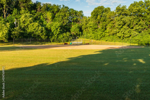 looking in towards Homeplate of this baseball field from centerfield viewpoint