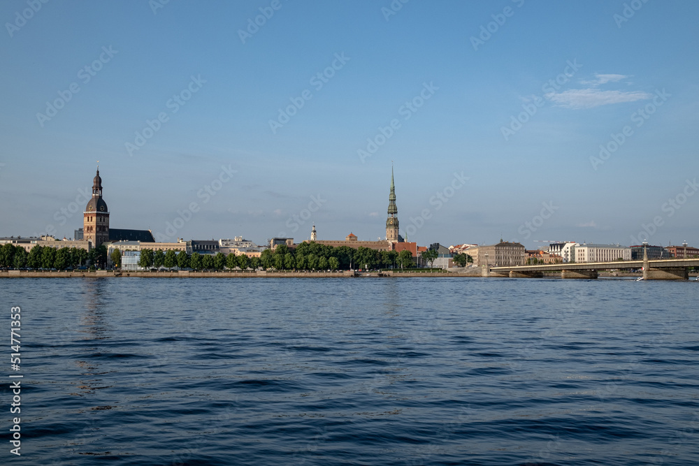 Obraz na płótnie River Daugava flows through Latvia capital Riga. Riga cityscape  w salonie