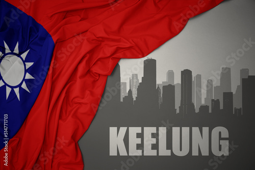 abstract silhouette of the city with text Keelung near waving national flag of taiwan on a gray background.3D illustration