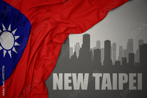 abstract silhouette of the city with text New Taipei near waving national flag of taiwan on a gray background.3D illustration