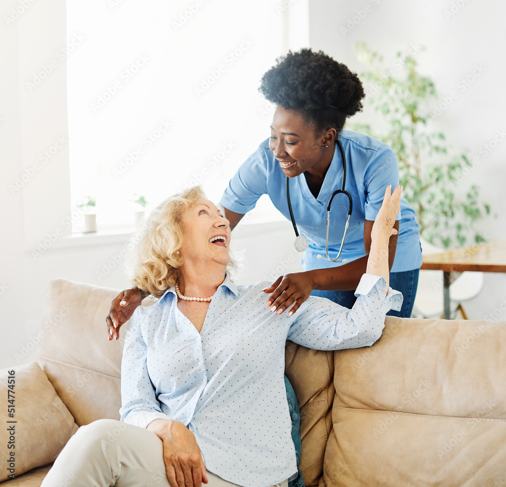 Fototapeta premium nurse doctor senior care caregiver help assistence retirement home nursing elderly woman health support african american black