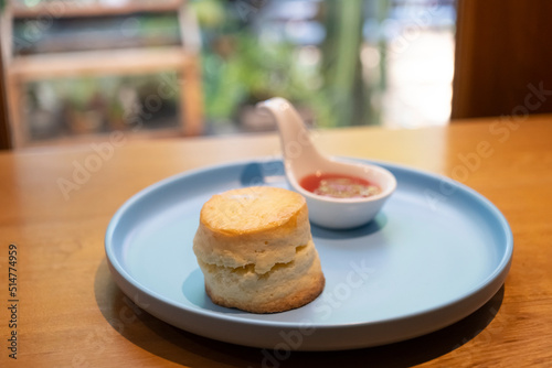 pieces of scones on blue plate at cafe