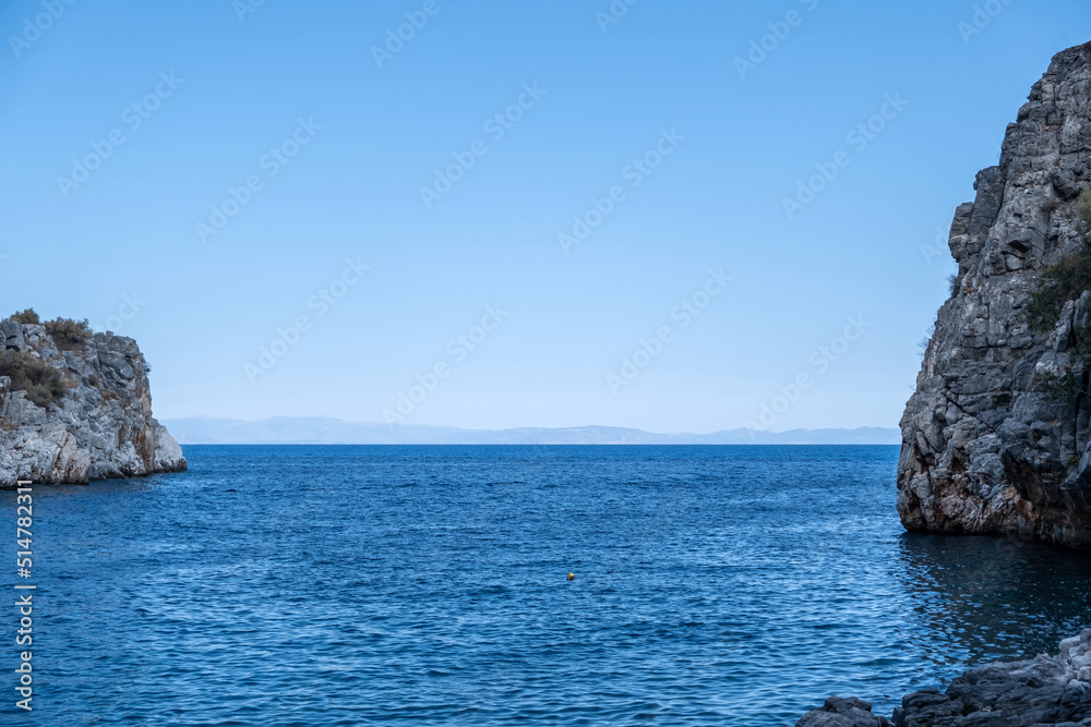 Greece. Calm sea, huge rocks. Mani Laconia, Peloponnese crystal clear water.