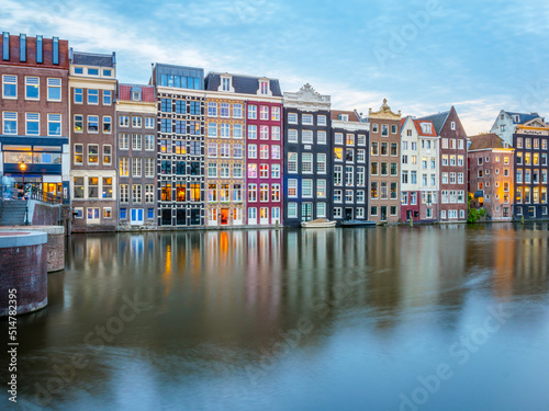 Amsterdam with river and houses in the city