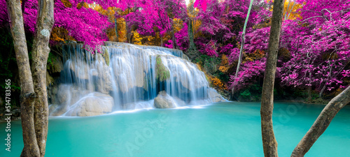 Fototapeta Naklejka Na Ścianę i Meble -  Amazing in nature, beautiful waterfall at colorful autumn forest in fall season