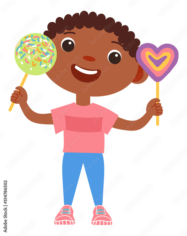 Cheerful boy holding lolipops. Happy child with caramel candy Cheerful boy holding lolipops. Happy child with caramel candy