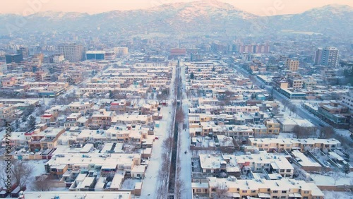 Beautiful view of Kabul city, Afghanistan, Snowing day winter season.  photo