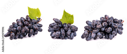 Set with black ripe grapes on white background.