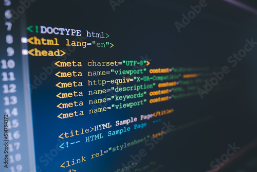 HTML code on computer monitor. Software / Web Developer Programming Code photo