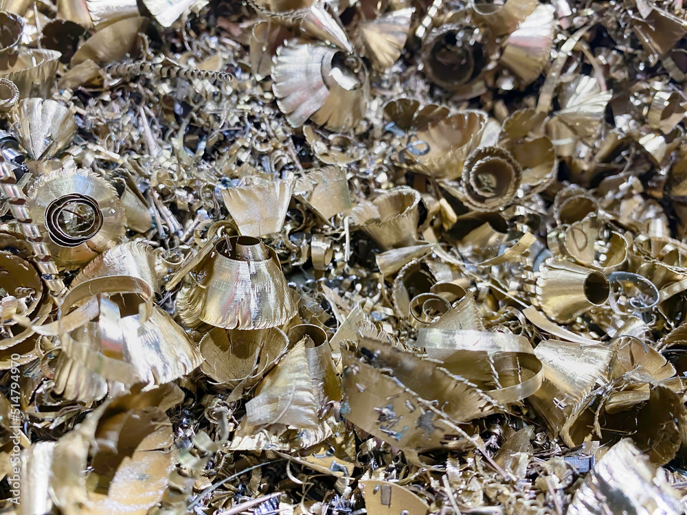 Bronze swarf from a cnc machine used in the manufacturing industry Bronze swarf from a cnc machine used in the manufacturing industry