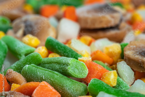 Frozen vegetables. Frozen vegetable mixture of carrots, corn and peas. © eliosdnepr