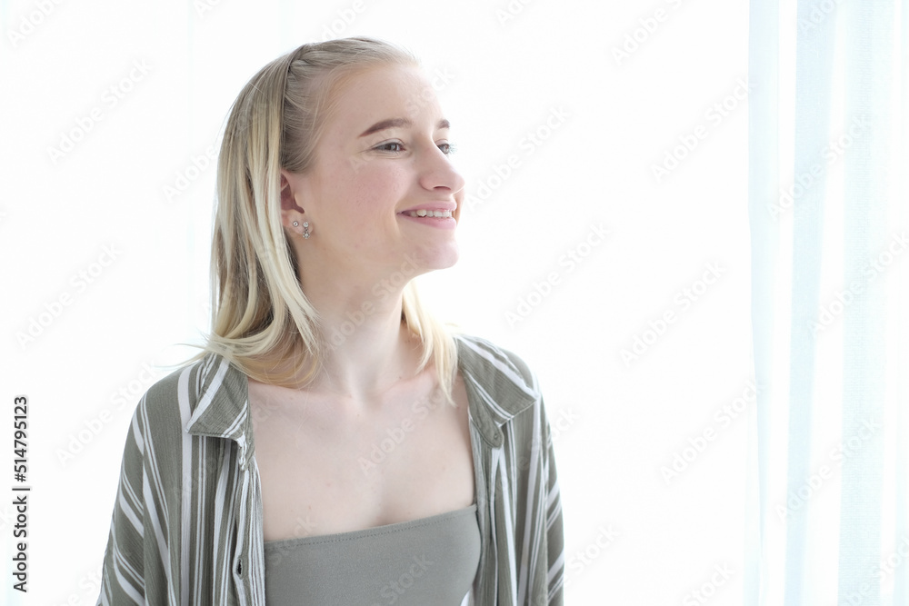 Portrait of blonde woman smiling at camera. Portrait of smiling cheerful beautiful pretty caucasian woman. Portrait of blonde woman smiling at camera. Portrait of smiling cheerful beautiful pretty caucasian woman.