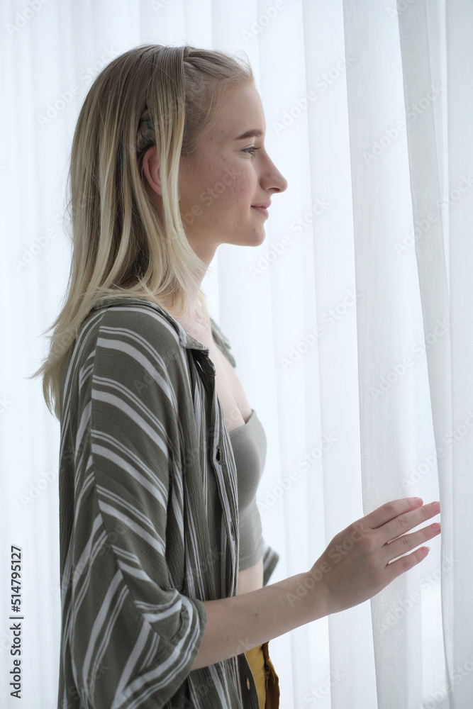 Portrait of blonde woman smiling at camera. Portrait of smiling cheerful beautiful pretty caucasian woman. Portrait of blonde woman smiling at camera. Portrait of smiling cheerful beautiful pretty caucasian woman.