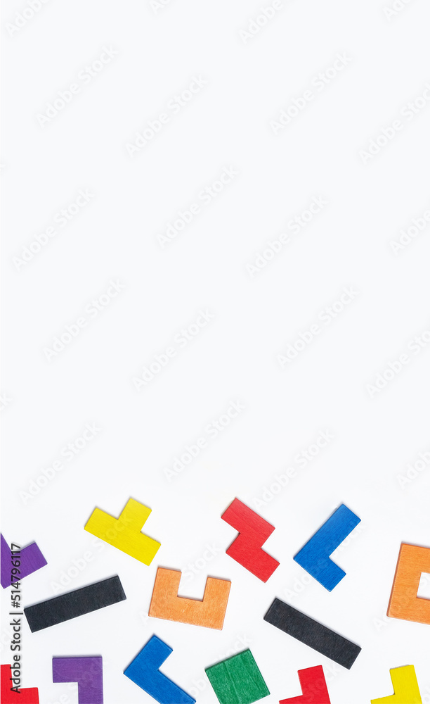 Scattered puzzle pieces on vertical banner with copy space. High quality photo Scattered puzzle pieces on vertical banner with copy space. High quality photo