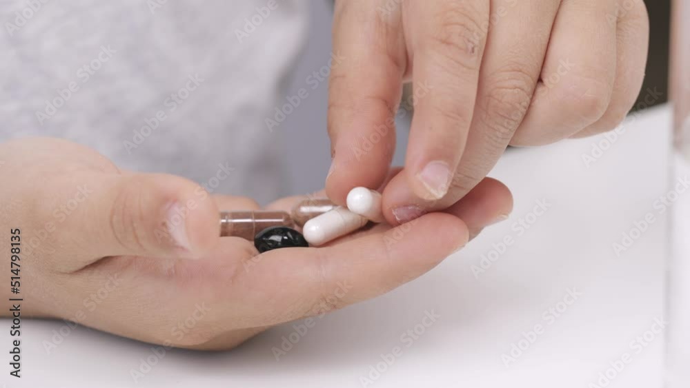 Pills in the hand of 9 years old boy. Closeup Pills in the hand of 9 years old boy. Closeup