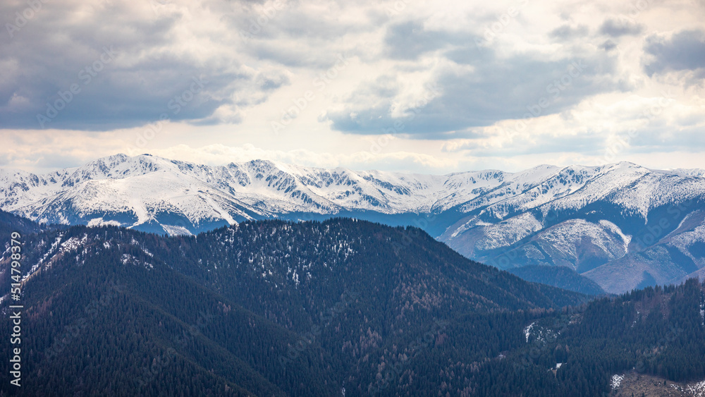 snow covered mountains during the winter